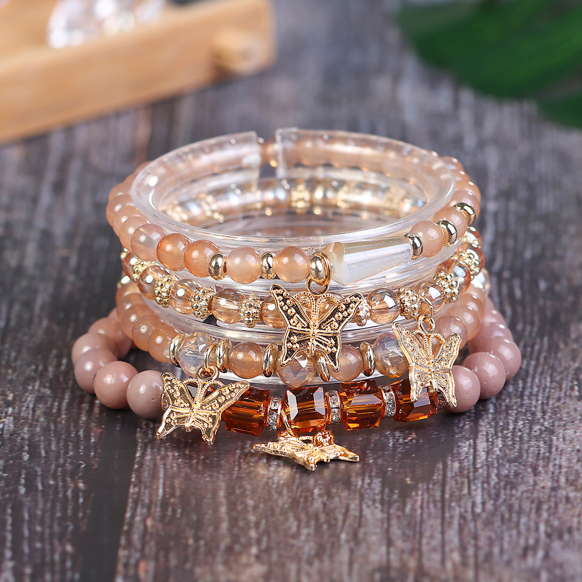 Wholesale Four Layer Butterfly Pendant Glass Elastic Bracelet